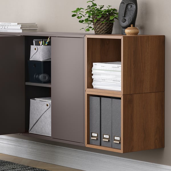 Wall-mounted storage with shelves and drawers.