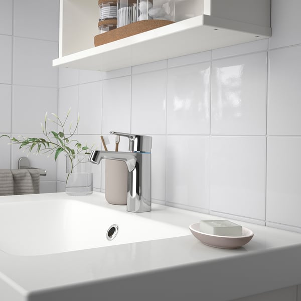 Small EKOLN soap holder, white, ceramic, bowl shape, fits neatly by sink.