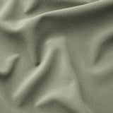 Close-up of textured, green EKTORP fabric; soft, durable, machine-washable.