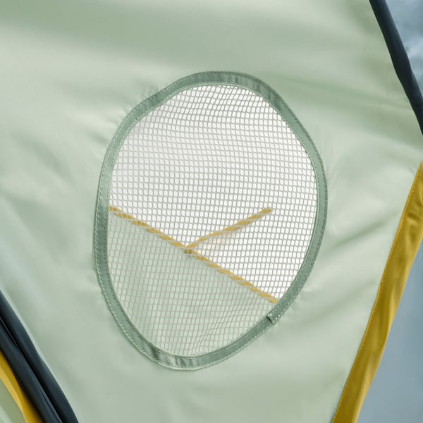 Mesh-pocketed kids tent, made with durable, recycled materials, securely attached to a bed for a cosy, private space.