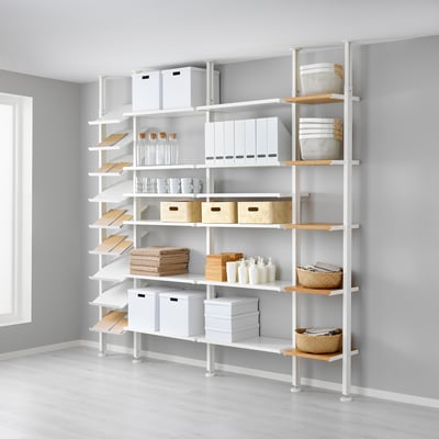 A white ELVARLI storage system with adjustable shelves and bamboo accents, organised with various items.
