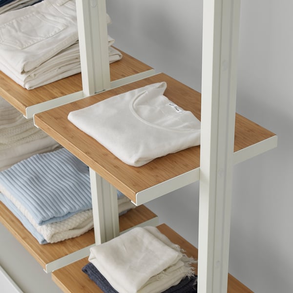 Wooden shelves, easy to instal, bamboo material, white metal frame, neatly folded clothes displayed.