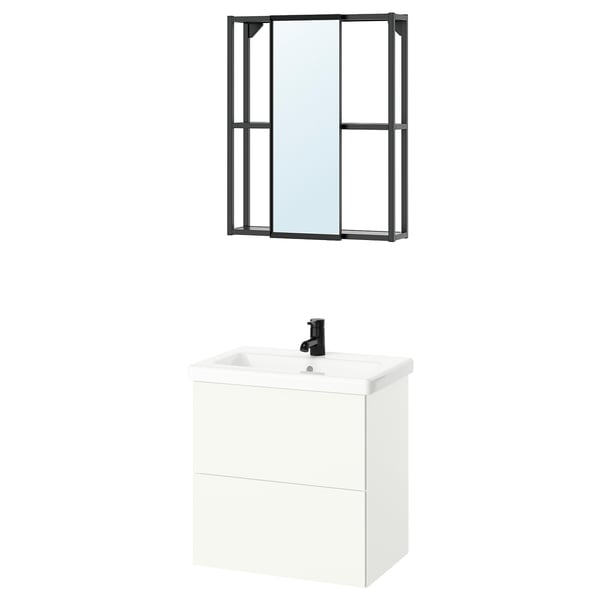 Modern bathroom setup with ENHET white cabinet, black faucet, and wall-mounted mirror with black frame.