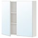 A white ENHET mirror cabinet with two doors and internal shelves, designed for bathrooms.