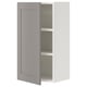An open ENHET wall cabinet in grey and white. It two shelves and a modern design.