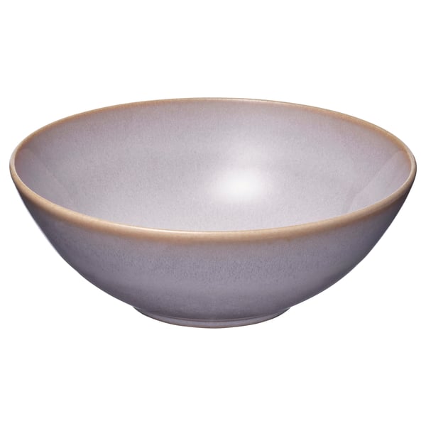 Lavender stoneware bowl, rustic texture.