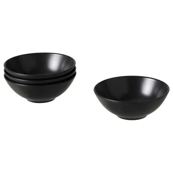 Black ceramic bowls, stackable, matte finish, round shape, simple design.