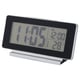 A FILMIS black and silver digital clock with led display, showing time, alarm, and temperature.