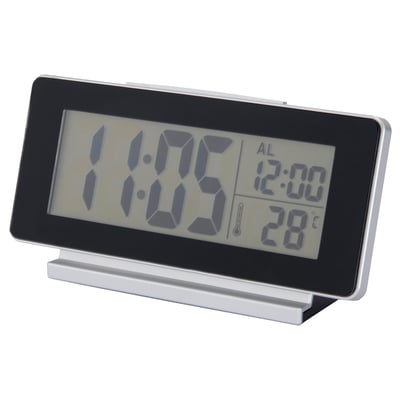 A FILMIS black and silver digital clock with led display, showing time, alarm, and temperature.