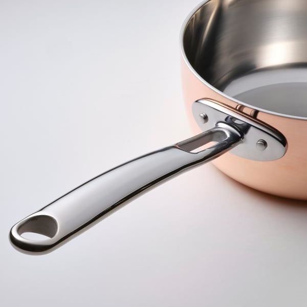 Stainless steel handle of FINMAT saucepan, securely riveted, polished and refined.