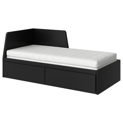 A black FLEKKE day-bed with a foam mattress and two large storage drawers.