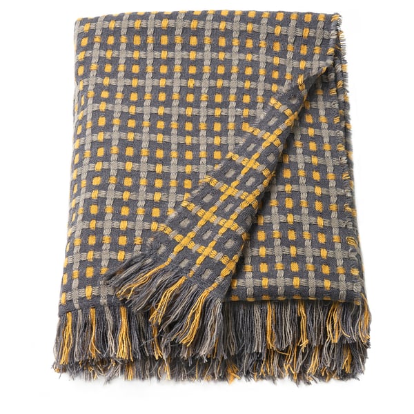 A grey and yellow woven throw blanket with fringes.