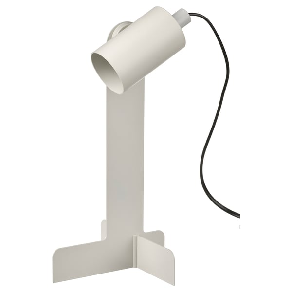 White adjustable desk lamp with cylindrical shade and small base. Modern design for small spaces.