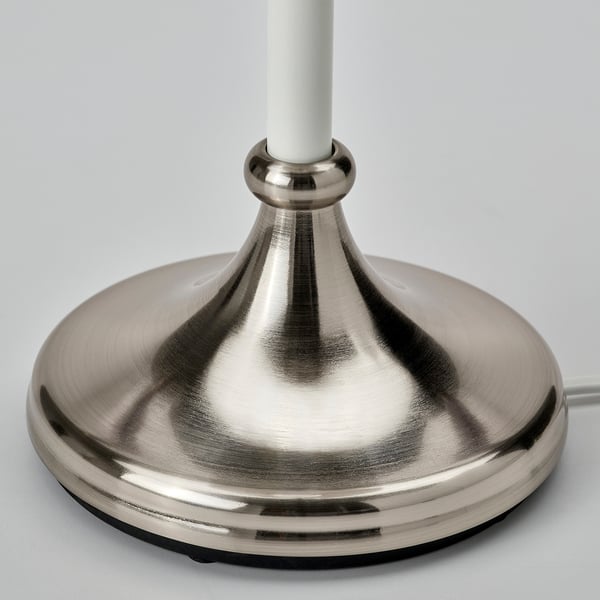 Silver lamp base with smooth, reflective surface and metal ring, showcasing high-quality finish and elegant design.