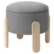 Round grey upholstered FÖRLUNDA stool with wooden legs.