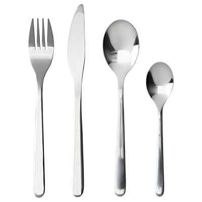 A set of four polished silver cutlery pieces: a fork, a knife, a spoon, and a teaspoon, neatly arranged in a row.