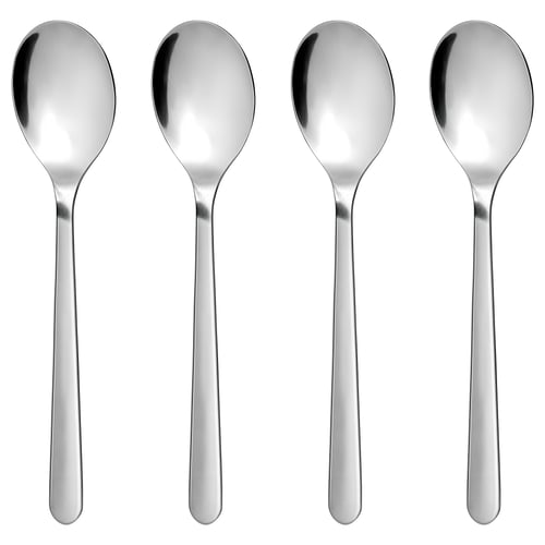 Four polished silver stainless steel spoons, modern design, lying side by side.