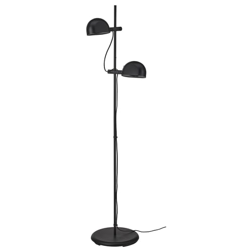A modern black FOLKBÅT floor lamp with two adjustable dome-shaped lights on a tall stand, providing versatile task lighting.