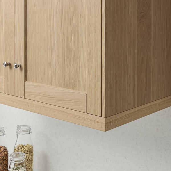 Wooden cabinet with under-lighting.