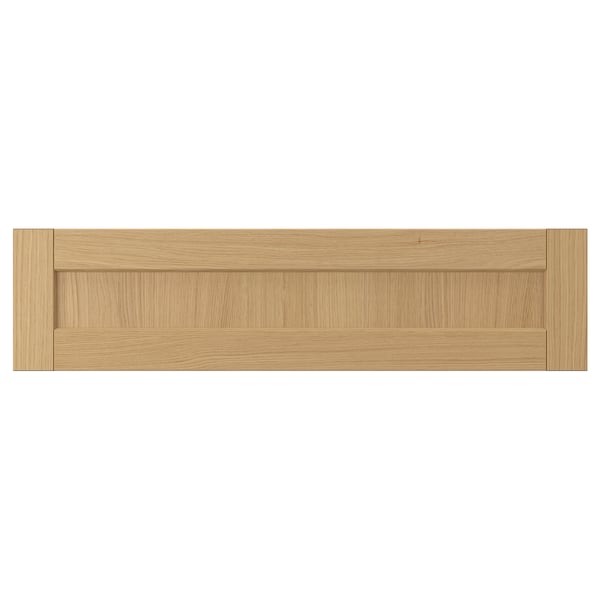 Forsbaka kitchen cabinet front in warm oak wood, featuring bevelled drawers, natural oak finish.