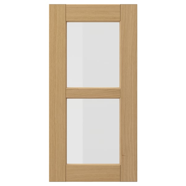 FORSBACKA: light oak wood kitchen cabinet door with glass panel, warm, rectangular design.