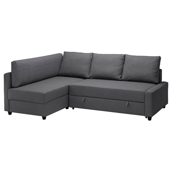 Gray fabric l-shaped sofa-bed with wood legs, 3 cushions, corner design, converts into bed.