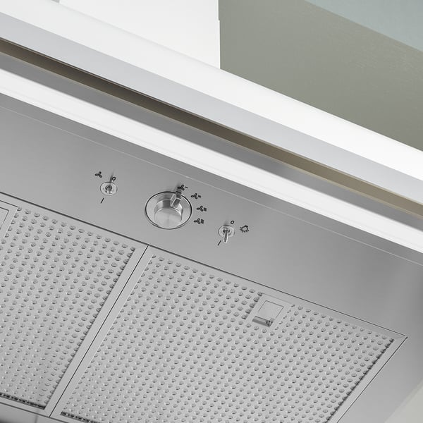 Modern kitchen hood with sleek, metallic design, efficient airflow, and led lighting.