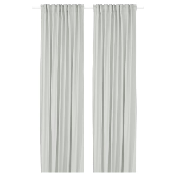 Image shows white GINSTMOTT curtains, sleek and straight, made from recycled polyester.
