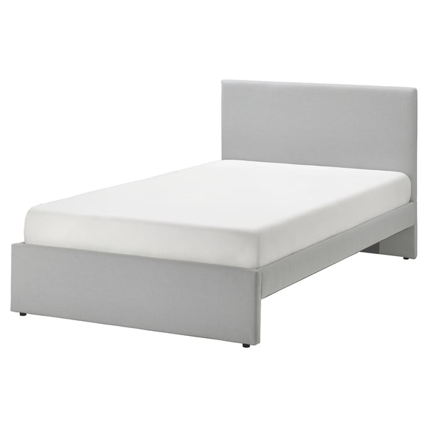 Modern grey upholstered bed, clean lines, padded headboard. Sleek & stylish design.