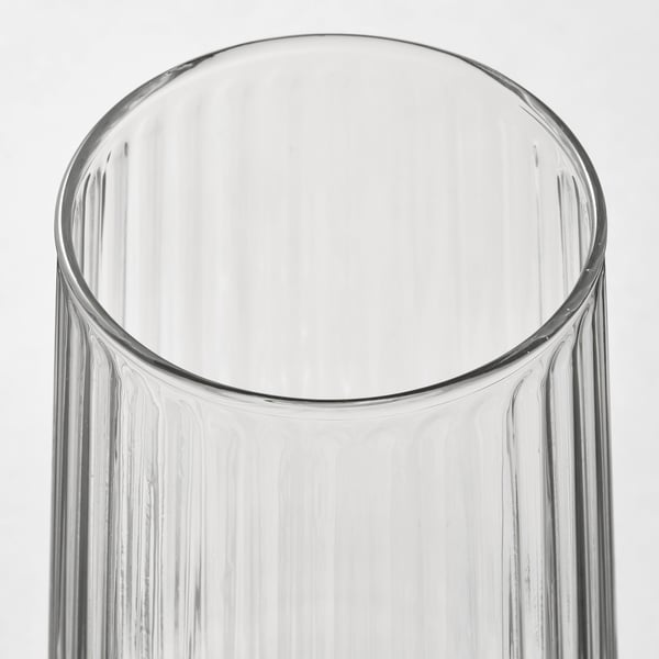 Clear, intricate glass vase with vertical grooves, high quality, modern design.