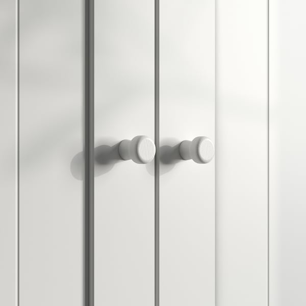 A white GULLABERG door with round knobs, featuring a timeless and traditional design for a classic look.