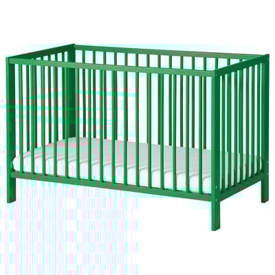 Bright green GULLIVER baby cot with white mattress, four raised sides, and simple rectangular design.
