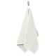 GULVIAL beige cotton towel, soft textured, rectangular, hangs on hook.