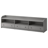 A grey HAUGA tv bench with 3 drawers and open shelves, perfect for organising accessories and keeping cables tidy.