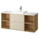 A HAVBÄCK bathroom vanity in beige with wooden accents, a ceramic sink, and open storage.