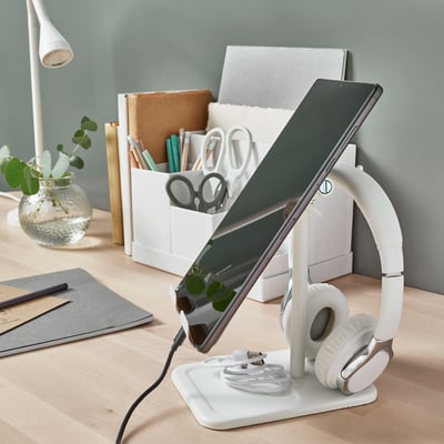 HAVREHOJ: white tablet & headphone stand, cork & steel, adjusts height & angle, small, fitting desk with notepad & vases.