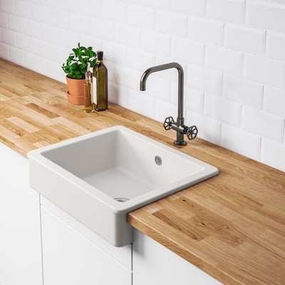 Modern HAVSEN sink, white ceramic bowl, wooden counter, stainless tap.