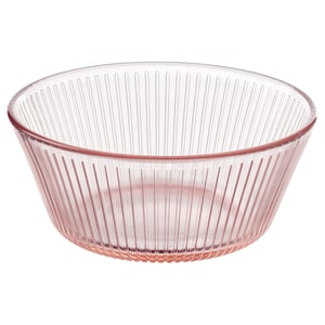A light pink, ribbed glass bowl with a round shape and smooth edges. Its part of the HAVSGÄDDA series.