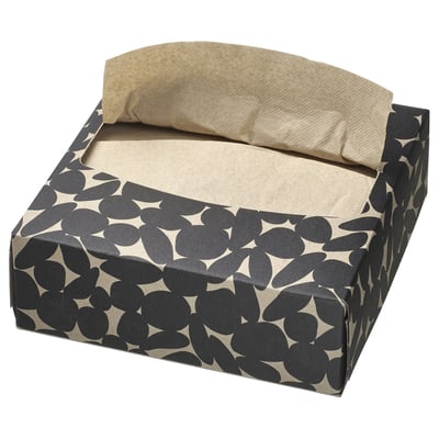 Black & white patterned paper box with beige napkins. Rectangular, decorative, recycled materials.