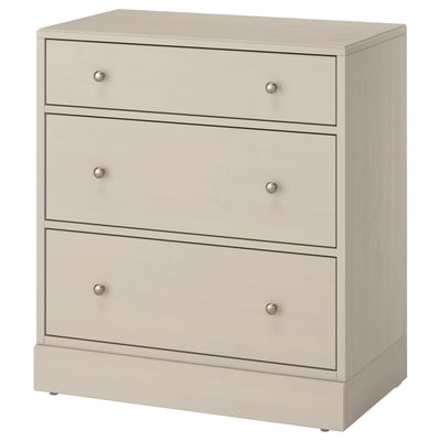 A beige HAVSTA chest of drawers. It is designed with three drawers, a sleek look, and durable pine material.