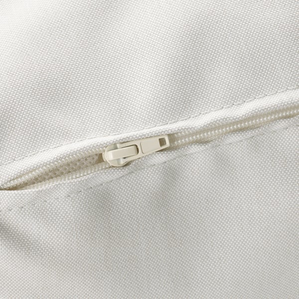 Close-up of zip on mesh outdoor cushion. Smooth pull and sturdy construction.