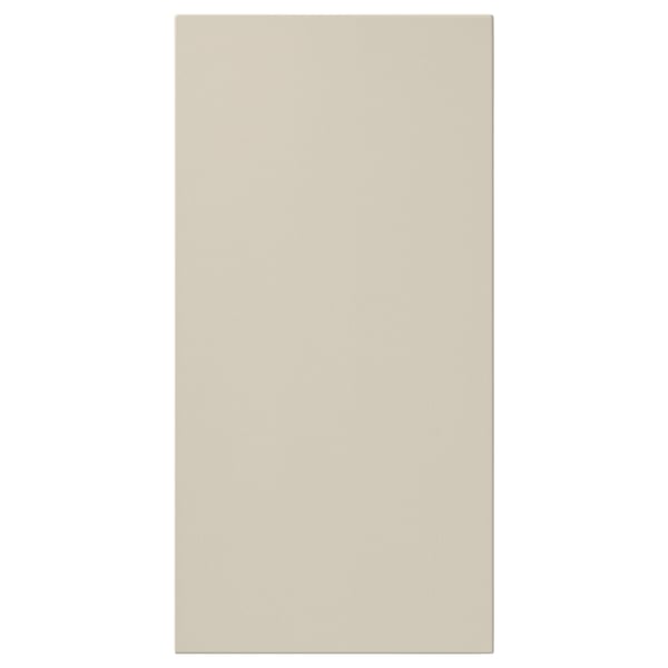 Beige HAVSTORP door, smooth & rectangular, fiberboard material, clean lines, modern design.