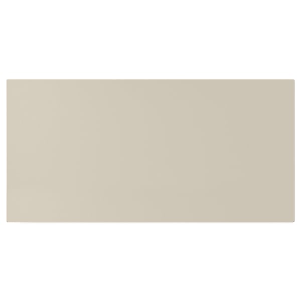 A beige HAVSTORP kitchen cabinet with a sleek, modern design and smooth, lacquered finish.