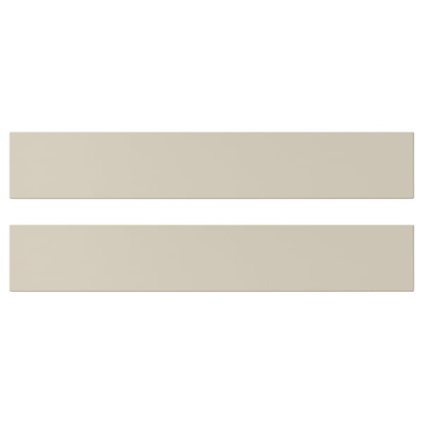 Image shows two smooth, beige HAVSTORP kitchen cabinet fronts. Rectangular shape with clean lines.
