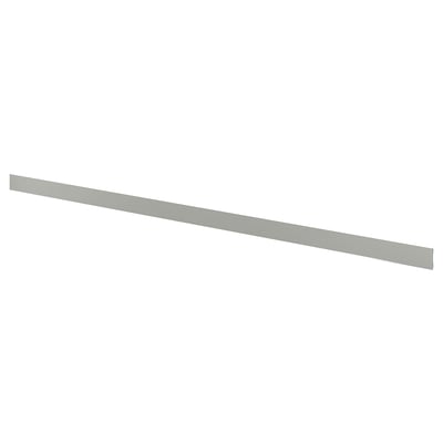 Light grey kitchen plinth, smooth and rectangular with clean lines.