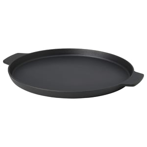 Black cast-iron pizza pan with handles. Round, flat surface.