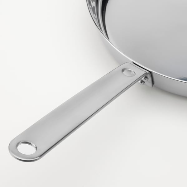 Stainless steel pan handle with reflection, secure, and hanging hole.