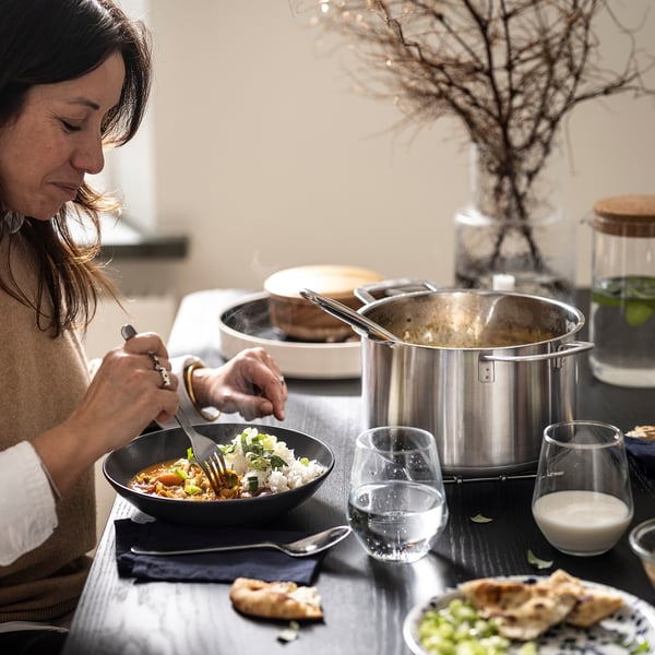 Person serving rice.
