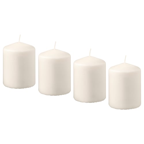Four white HEMSJÖ pillar candles in a row. Simple, cylindrical shape, made from plant-based wax.