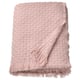 Light pink HORNMAL throw blanket, fringed, woven texture, 100% recycled polyester.